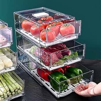 Clear storage organisers arranged with fresh produce